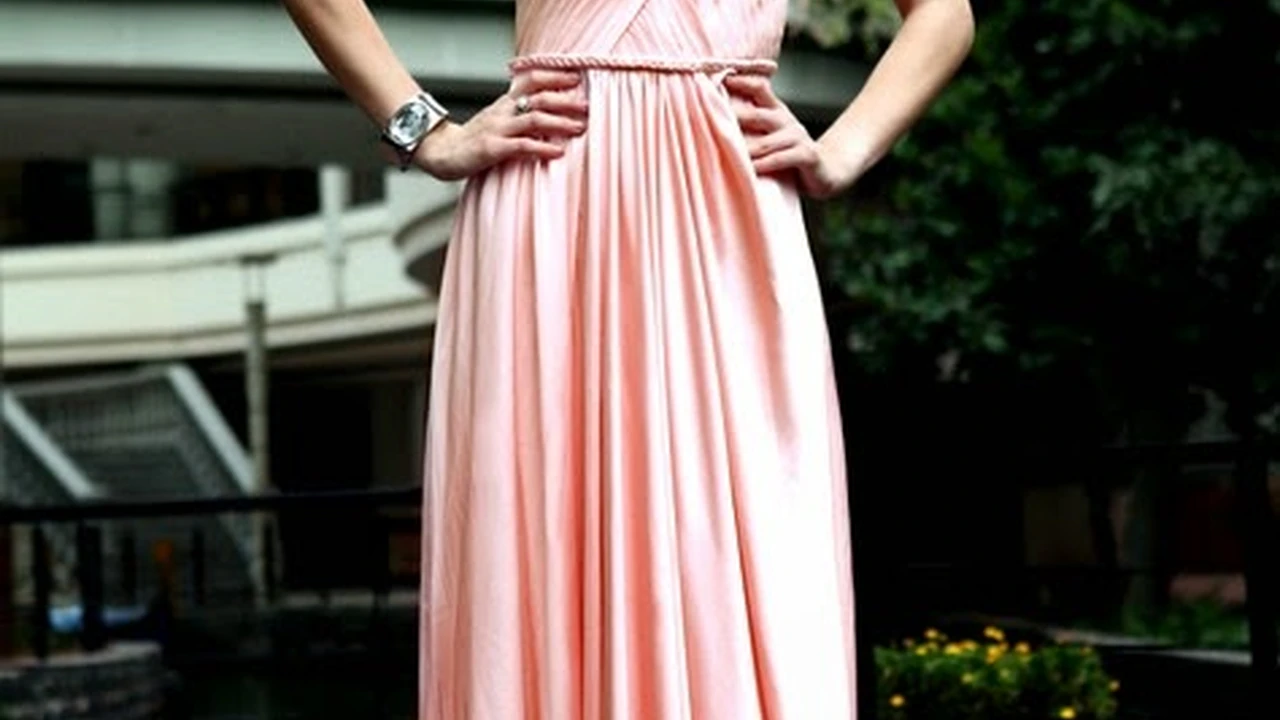 overhead view of corned beef sliced and on a platter with cabbage, potatoes, and carrots