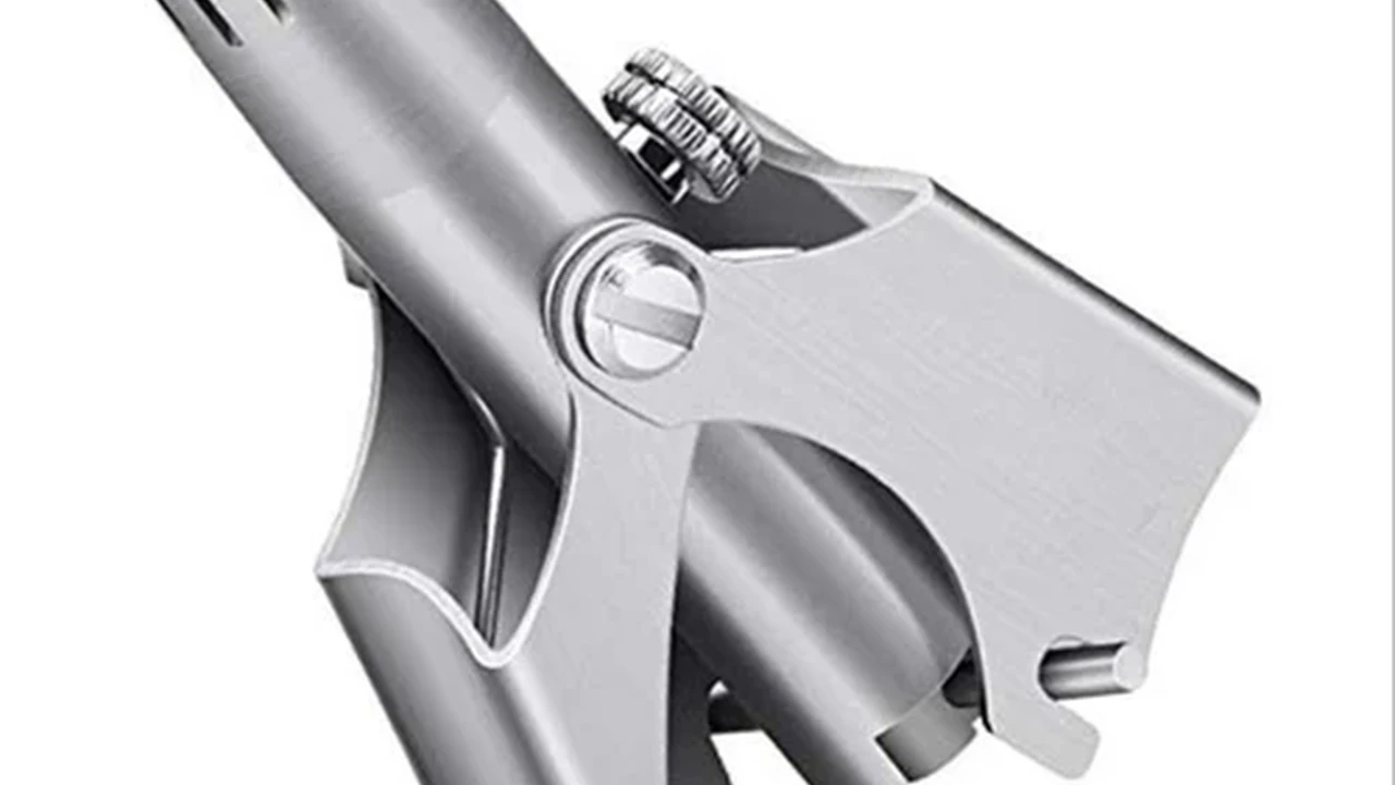 Two mint chocolate milkshakes with whipped cream and green sprinkles.