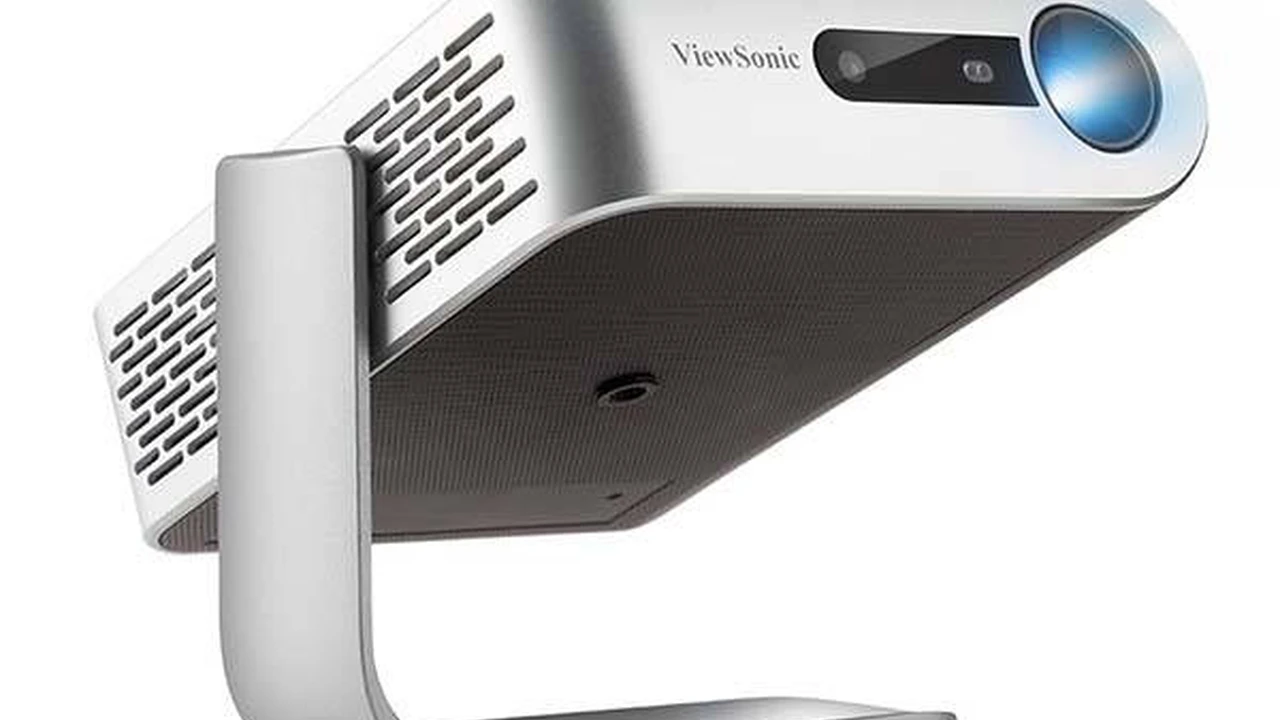 overhead view of corned beef sliced and on a platter with cabbage, potatoes, and carrots