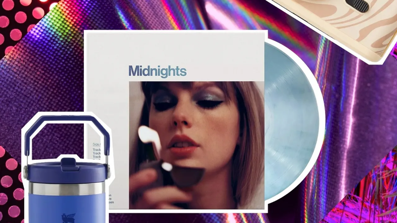 Two mint chocolate milkshakes with whipped cream and green sprinkles.